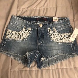 New jean shorts, tags attached, size 3 lace accent
